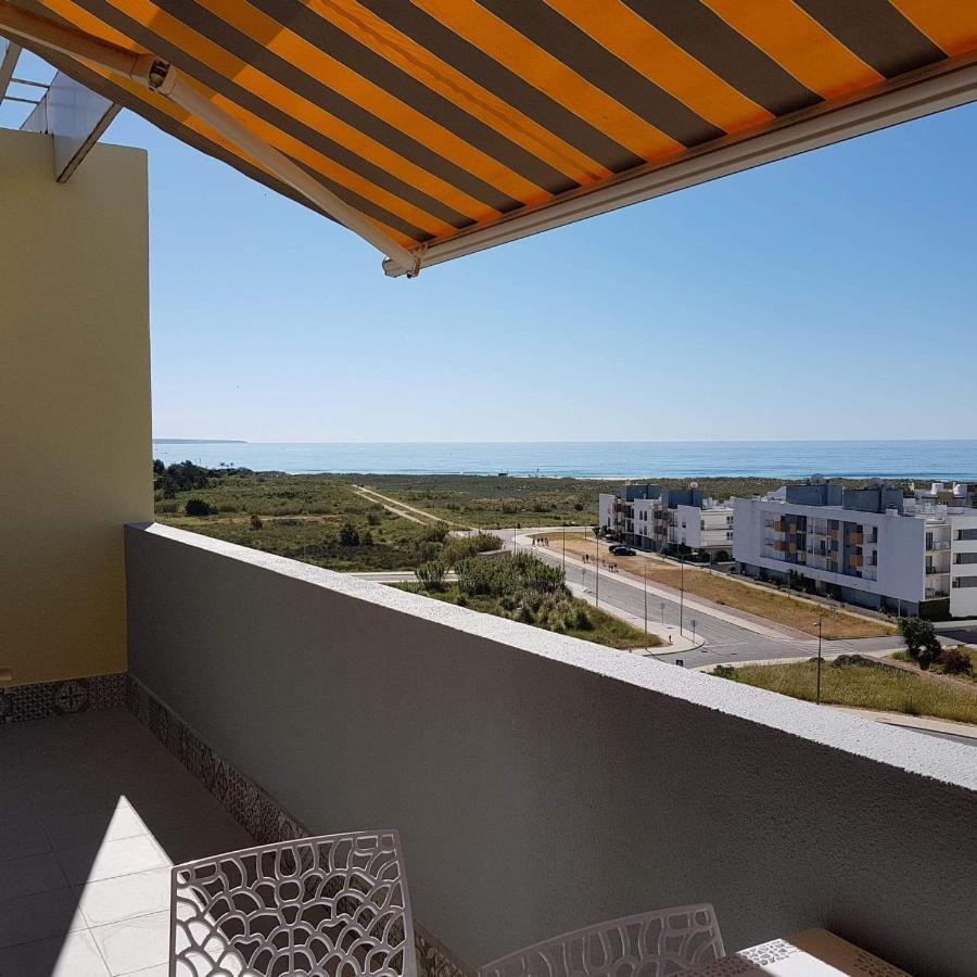 Vue panoramique sur mer Condominio Do mar Lagos Extérieur photo